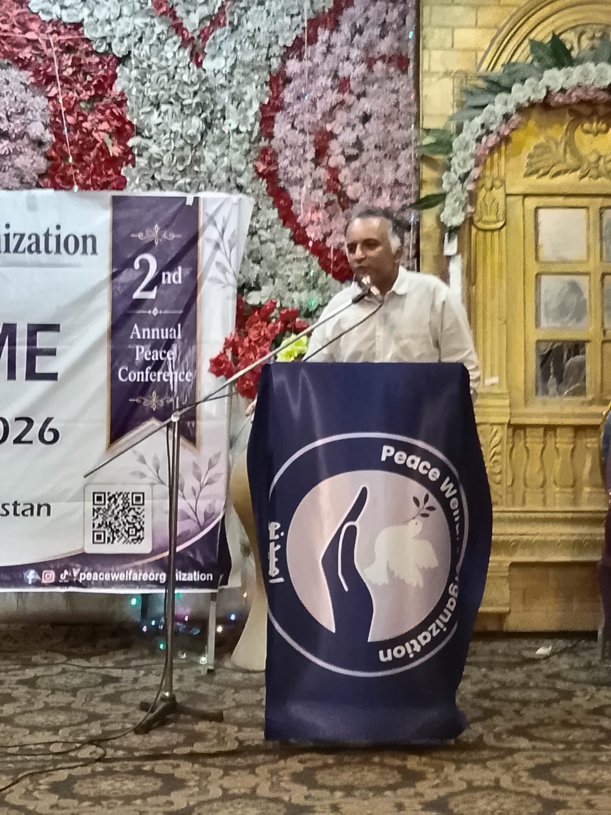 A speaker shares remarks during the conference.