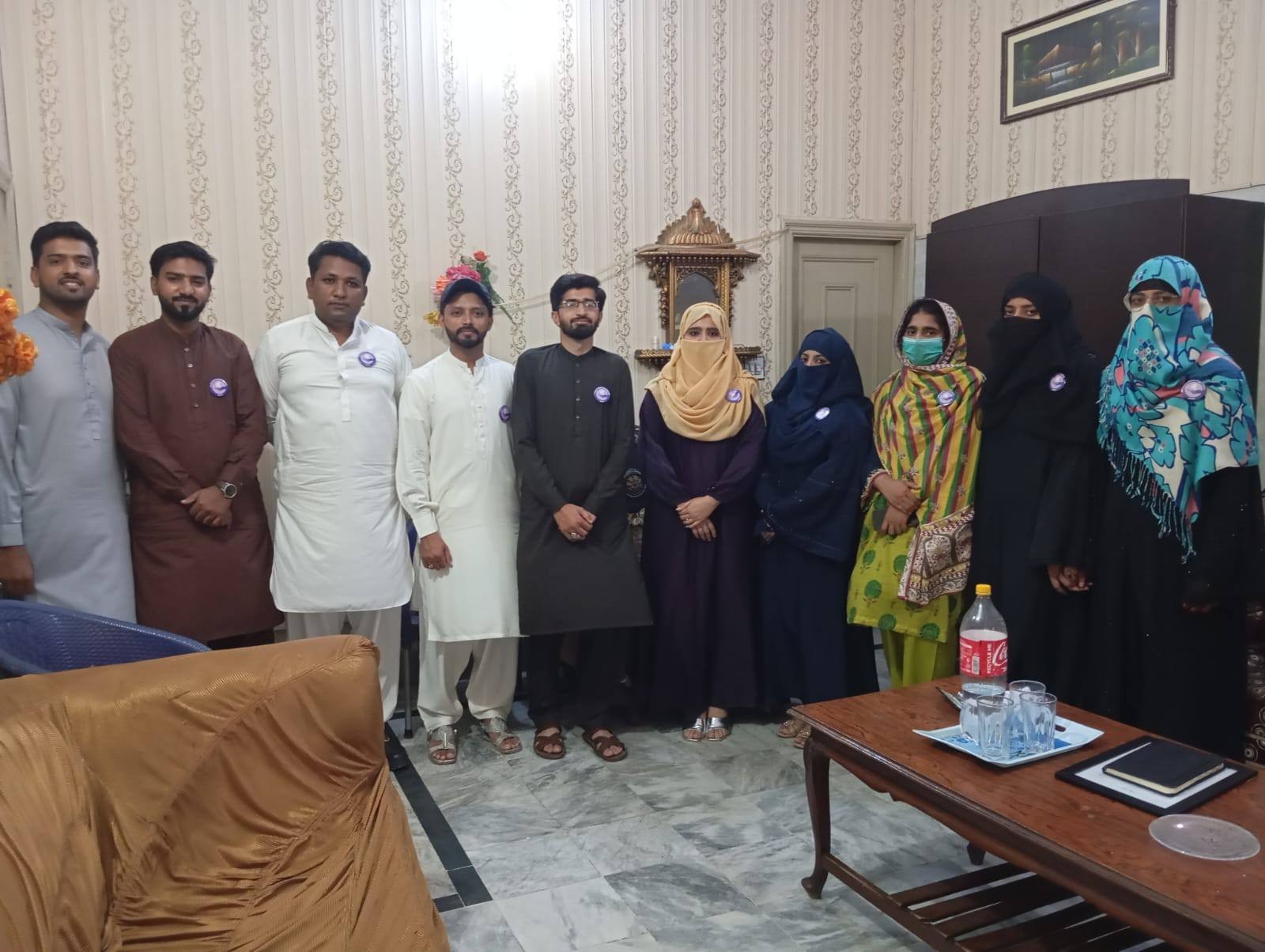 Group photo of PWO members with the Press Club cabinet.